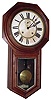 Ansonia Clock Co., New York, "Regulator A" wall clock, 8 day, time and strike, spring driven movement with second's bit in black walnut, with veneered drop, with papered metal dial, c1900