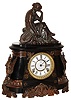 Ansonia Clock Co., New York, "Pompeii", 8 day, time and strike, enameled iron mantel clock with accompanying statue "Music", c1904