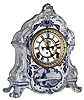 Ansonia Clock Co., New York, Royal Bonn "La Rambla", 8 day, time and strike, Delft style porcelain mantel clock, with open escapement in dial center, c1900