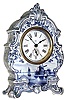Ansonia Clock Co., New York, "Delft", 30 hour, lever movement alarm timepiece in Royal Bonn porcelain case. Bottom of case is marked: "Royal Bonn Delft", c1900