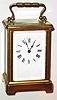 French 8 day time only brass and beveled glass Corniche style carriage clock, c1900