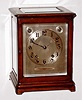Winterhalder and Hofmeier, for Bailey, Banks and Biddle, Philadelphia, 8 day quarter striking mahogany and beveled glass mantel clock, c1900
