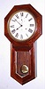 Seth Thomas Clock Co., Thomaston, Conn., "World" wall clock, 15 day, time only, spring driven movement in rosewood veneer case with painted metal dial and second's bit, c1909