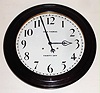 Seth Thomas Clock Co., Thomaston, Conn., "Gallery" wall clock, 30 day, time only, spring driven movement in mahogany case with painted metal 18" dial, c1909