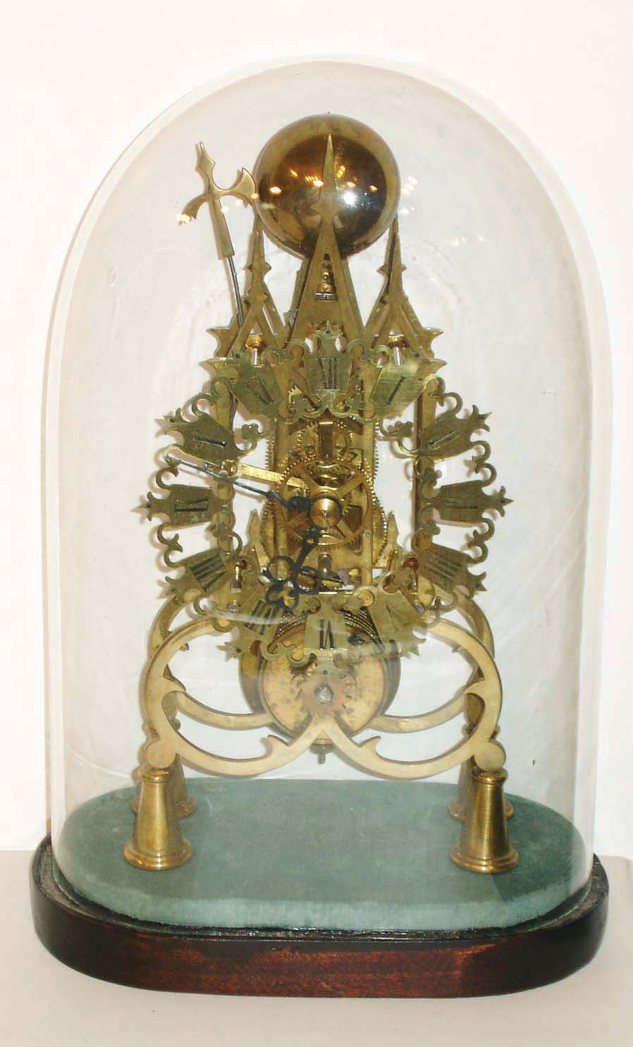 Single fusee, gothic style skeleton, time & single hour strike, european origin, mid 20th century, with old glass dome and base. — Antique Clocks Price Guide