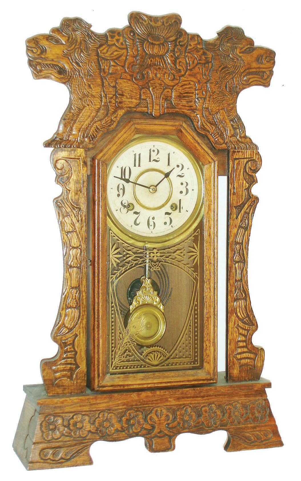 New Haven Clock Co., New Haven, Conn.,  "Norwich Line", 8 day, time and strike pressed oak mantel clock, c1907 — Antique Clocks Price Guide