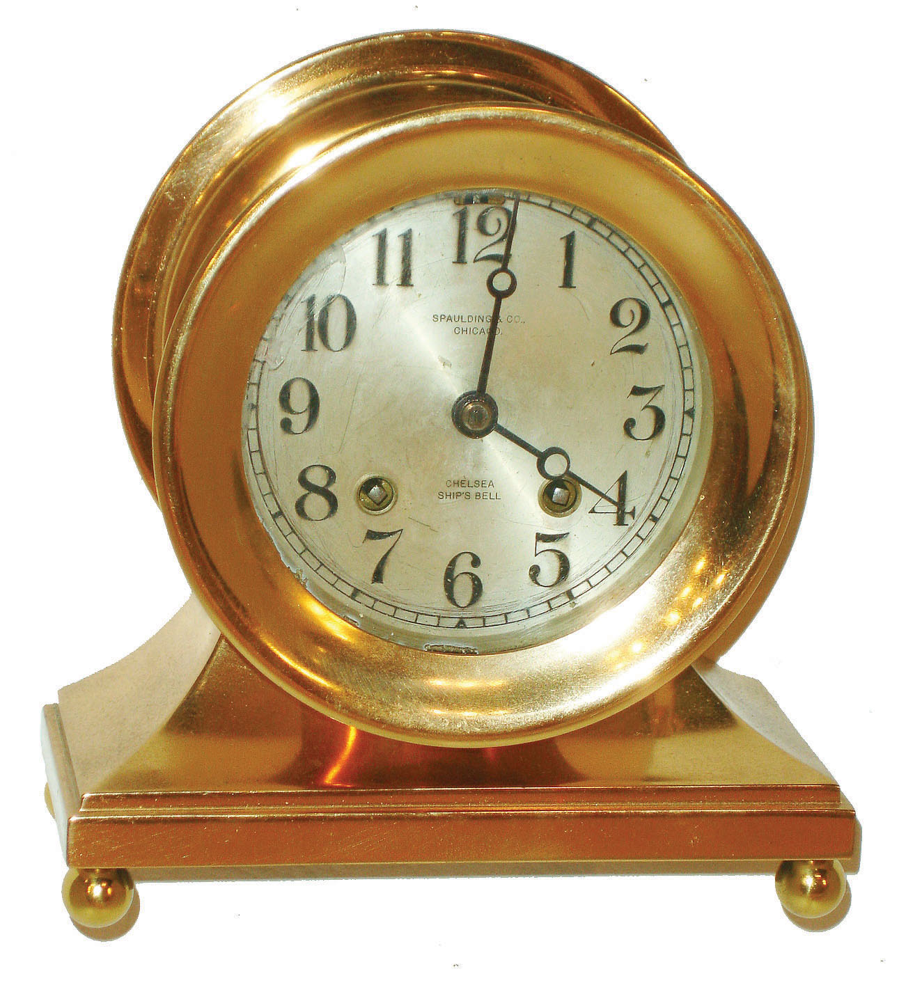 Chelsea Clock Co., Boston, "Commodore" or "Base and Ball" cast brass 4.5" dial 8 day ship's bells mantel clock, retailed by Spaulding & Co., Chicago, 1919 — Antique Clocks Price Guide