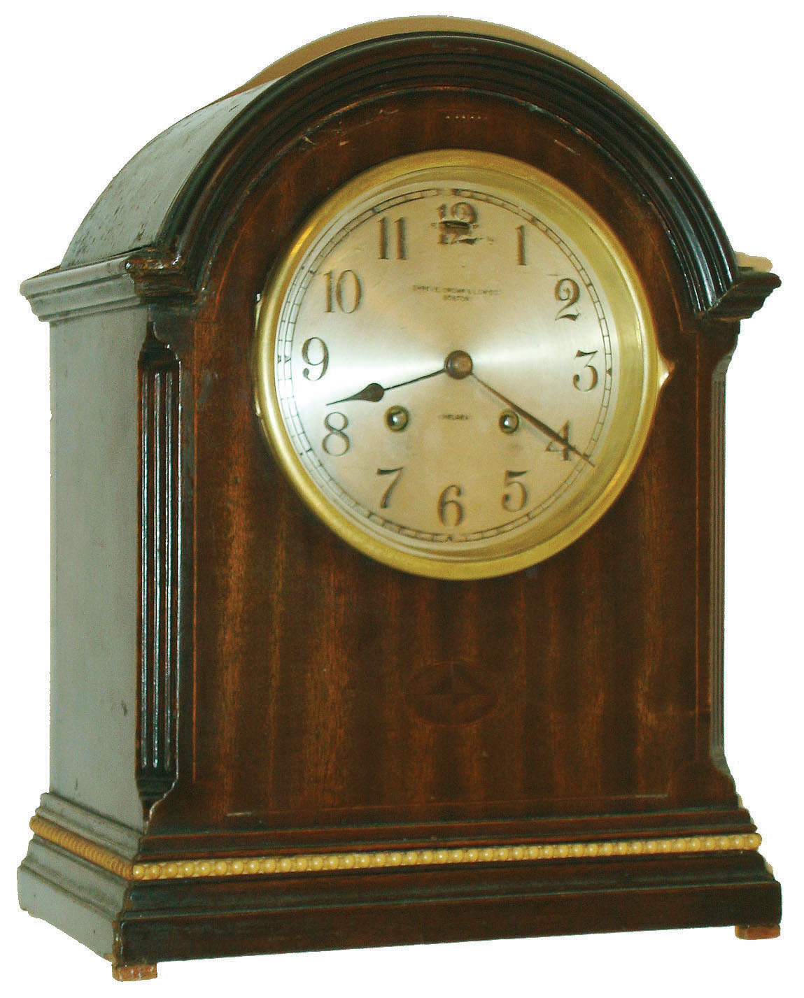 Chelsea Clock Co., Chelsea, Mass., 8 day time and house strike brass lever movement mantel clock with the Serial no. 157848, c1925.  We could not find this specific model in the Chelsea catalog, but a similar model is labeled: "Mahogany Dome". — Antique Clocks Price Guide