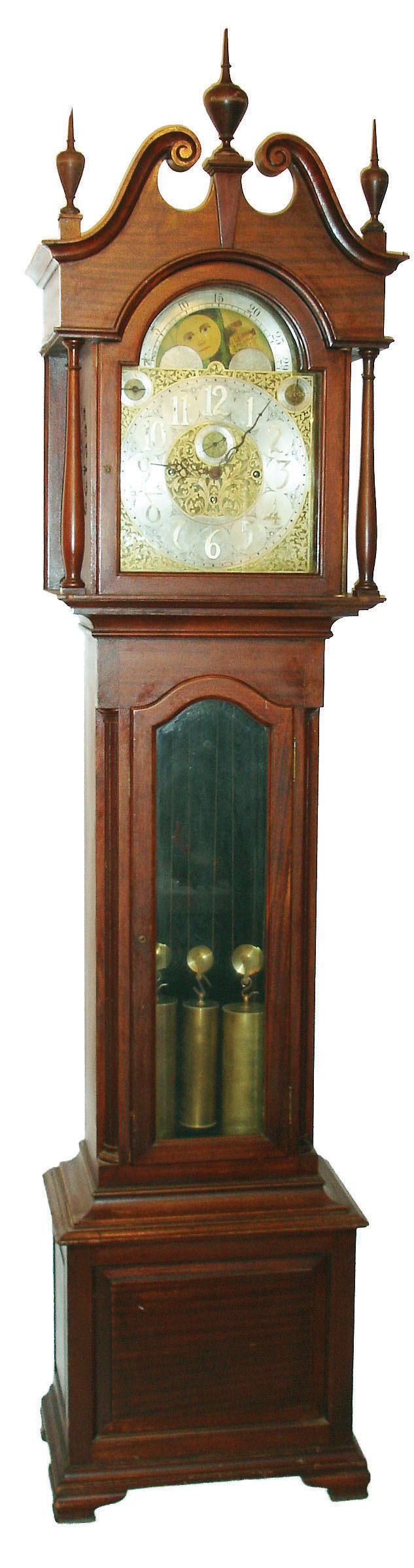 Seth Thomas Clock Co., Thomaston, Conn., "Sonora Chiming Hall Clock No. 33-84" tall clock, 8 days, time, strike and Westminster chime on 8 bells with selector for silent / hour strike / chime, three weight driven No. 84 movement with patented Sonora bells and box in a mahogany case with beveled glass trunk door, broken arch pediment and No. 443 pierced, silvered and etched superior dial with moon phase and raised applied numerals, c1910 — Antique Clocks Price Guide