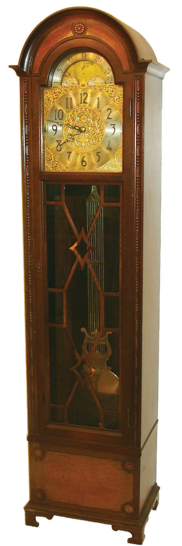 Herschede Electric Clock Co., Cincinnati, Ohio, 9 tube hall clock, electric, time, strike and chime playing three tunes, Westminster, Whittington and Canterbury, pendulum regulated movement in a mahogany case with silvered and brass dial and moon phase, c1930 — Antique Clocks Price Guide