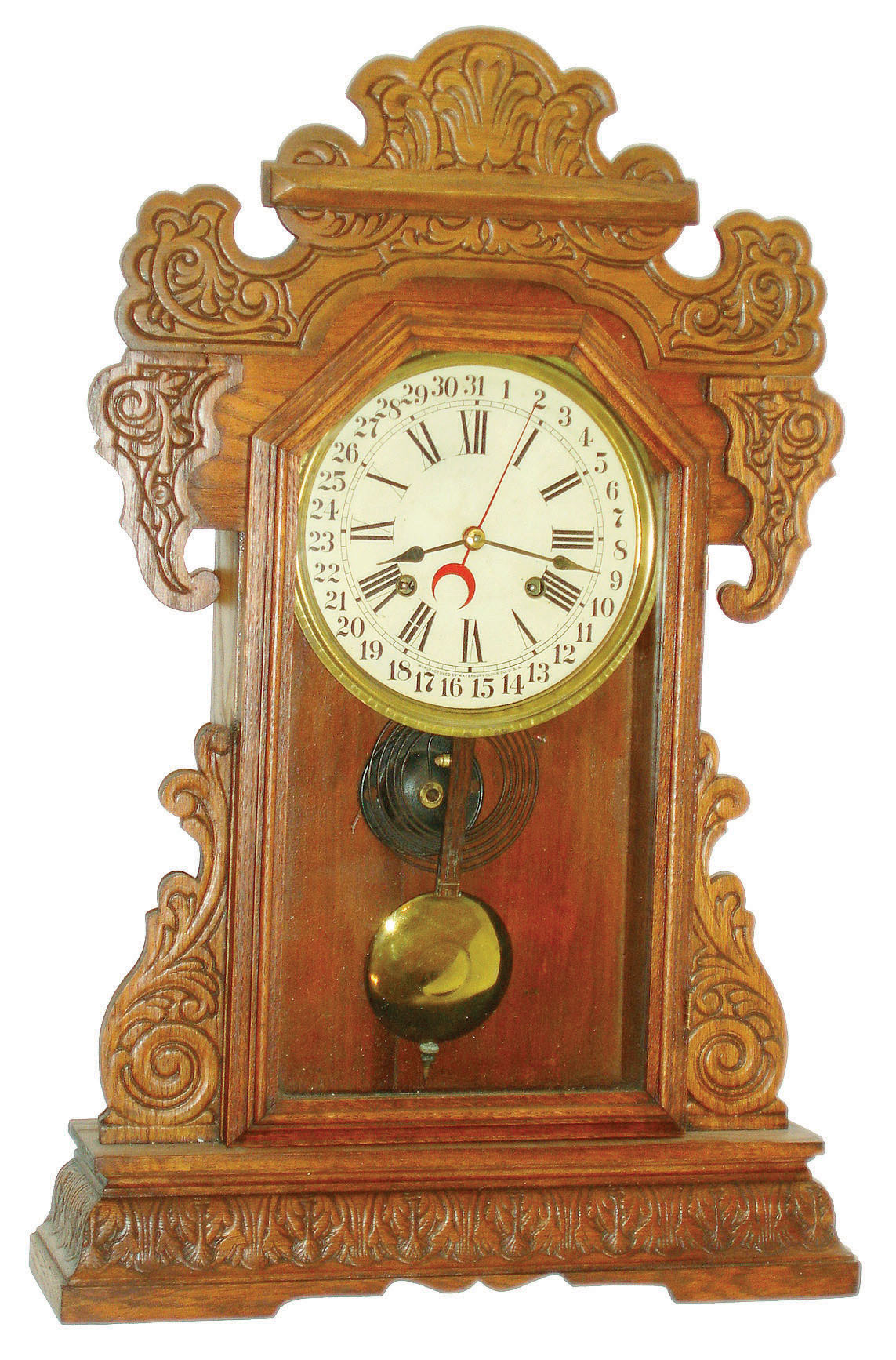 Clocks- 2 (Two) calendar clocks:  (1) Waterbury Clock Co., "Rochester", 8 day, time and strike calendar clock, c1908 and  (2) E. Ingraham & Co., 8 day, time and strike calendar clock (We could not find this model in the catalog). — Antique Clocks Price Guide