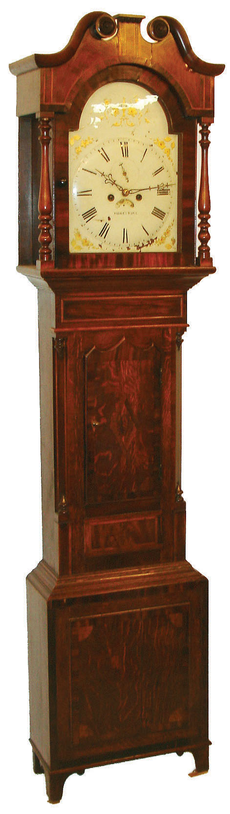 Honeybone, English tall clock, 8 days, time, strike and calendar, weight driven movement in an inlaid mahogany veneer case with broken arch and fancy urn shaped columns on hood and painted iron dial, c1850 — Antique Clocks Price Guide