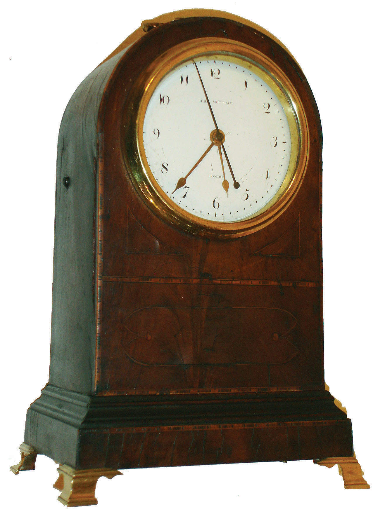 John Mottram, London, miniature time only bracket clock with sweep seconds, the Regency style veneered mahogany case with multicolor bands of inlay and fine string inlay, brass bezel, brass carrying handle, and molded base with brass bracket feet, locking back door with old glass and ivory escutcheon, Arabic numeral white enamel dial with gold spade hands and black painted brass sweep second hand, 8 day fusee timepiece movement with shouldered plates, tapered, turned pillars, and recoil escapement outside the back plate, key wind and set from back, c1800 — Antique Clocks Price Guide
