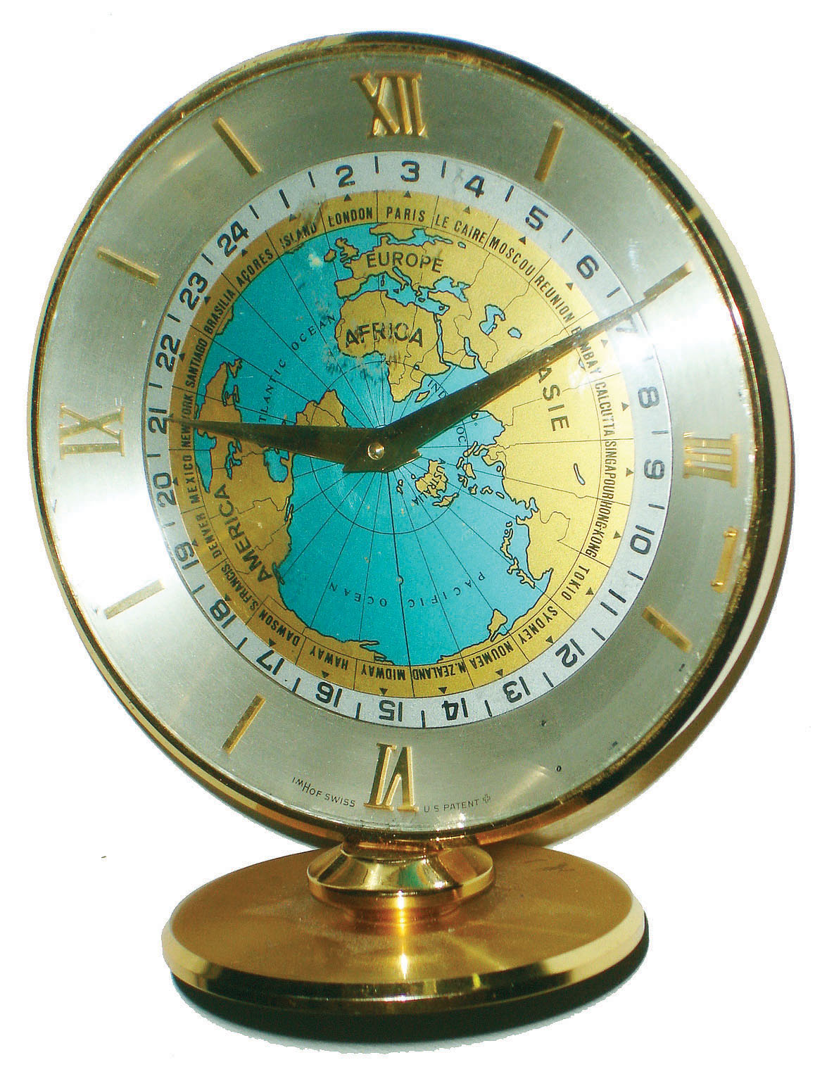 Imhof, Swiss, 15 jewel brass and glass world time desk clock, c1970 — Antique Clocks Price Guide