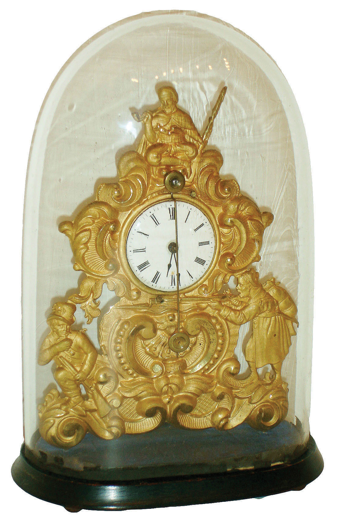 Austria, zappler clock with base and dome, pressed brass case with bright and matte surfaces, decorated with rococo ornament and with three armed male figures, ebonized wooden base on tiny wooden feet, Roman numeral white enamel dial with steel spade hands, 30 hour time only movement with tic-tac escapement and pendulum swinging in front of the dial, all under a glass dome, c1860 — Antique Clocks Price Guide