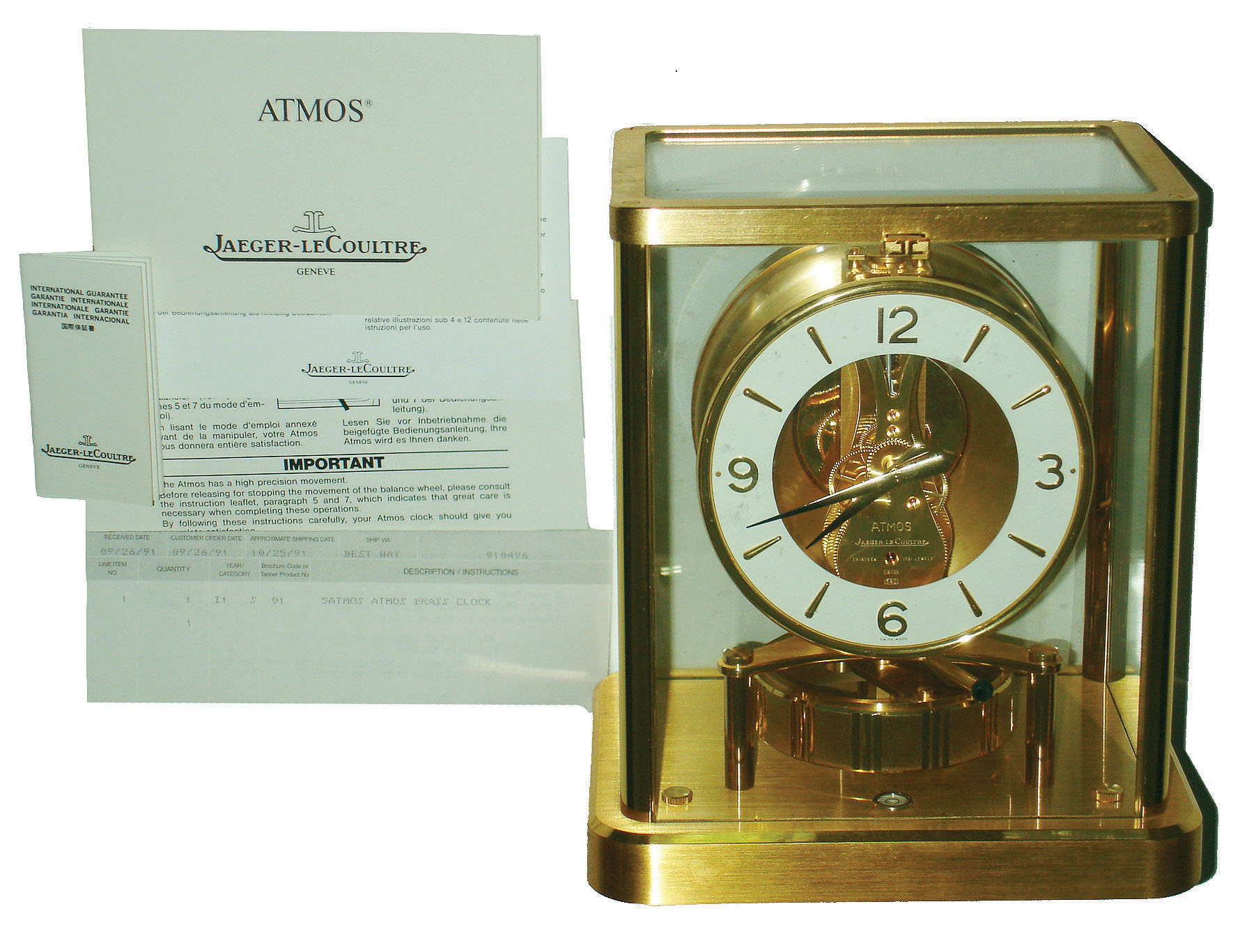 Jaeger-LeCoultre, Swiss "Atmos" gold plated brass and glass mantel clock, with original boxes and papers, 1991 — Antique Clocks Price Guide