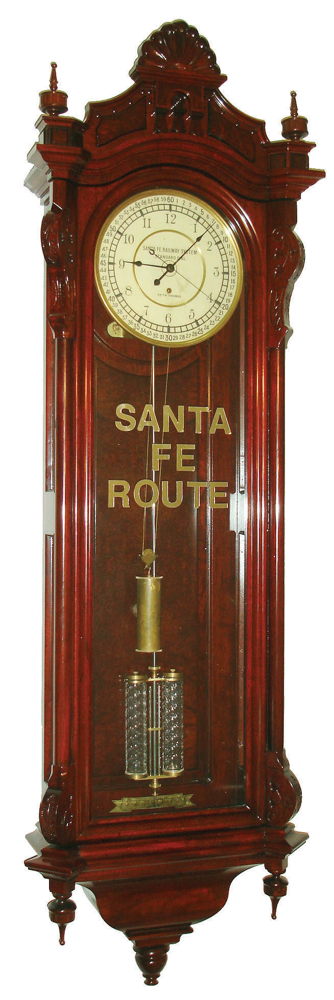 Reproduction Seth Thomas Clock Co., "Regulator No. 19" wall clock, 8 days, time only, weight driven movement in a mahogany case with papered metal dial signed "SANTA FE RAILWAY SYSTEMS STANDARD DIAL", c2000 — Antique Clocks Price Guide