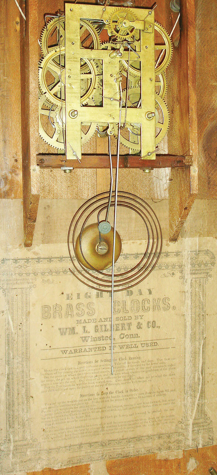 Wm. L. Gilbert & Co., Winsted, Conn., 8 day, time and strike weight brass movement shelf clock, c1858.  This case was designed by Chauncey Jerome as noted in the label pasted inside the door that reads: "Patented April 14, 1857, by Chauncey Jerome", — Antique Clocks Price Guide