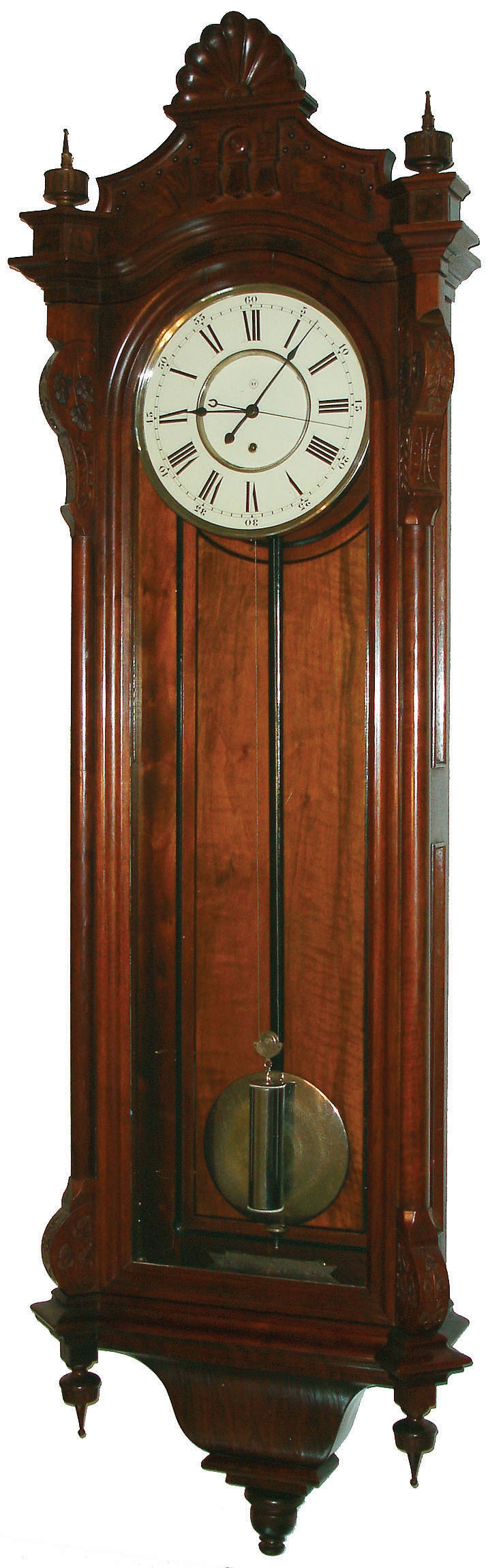 Seth Thomas Clock Co., Thomaston, Conn., "Regulator No. 16" wall clock, 8 days, time only, weight driven movement with Graham dead beat escapement and nickel plated damascened pendulum bob in a walnut case with burled walnut highlights and painted metal dial, c1885 — Antique Clocks Price Guide