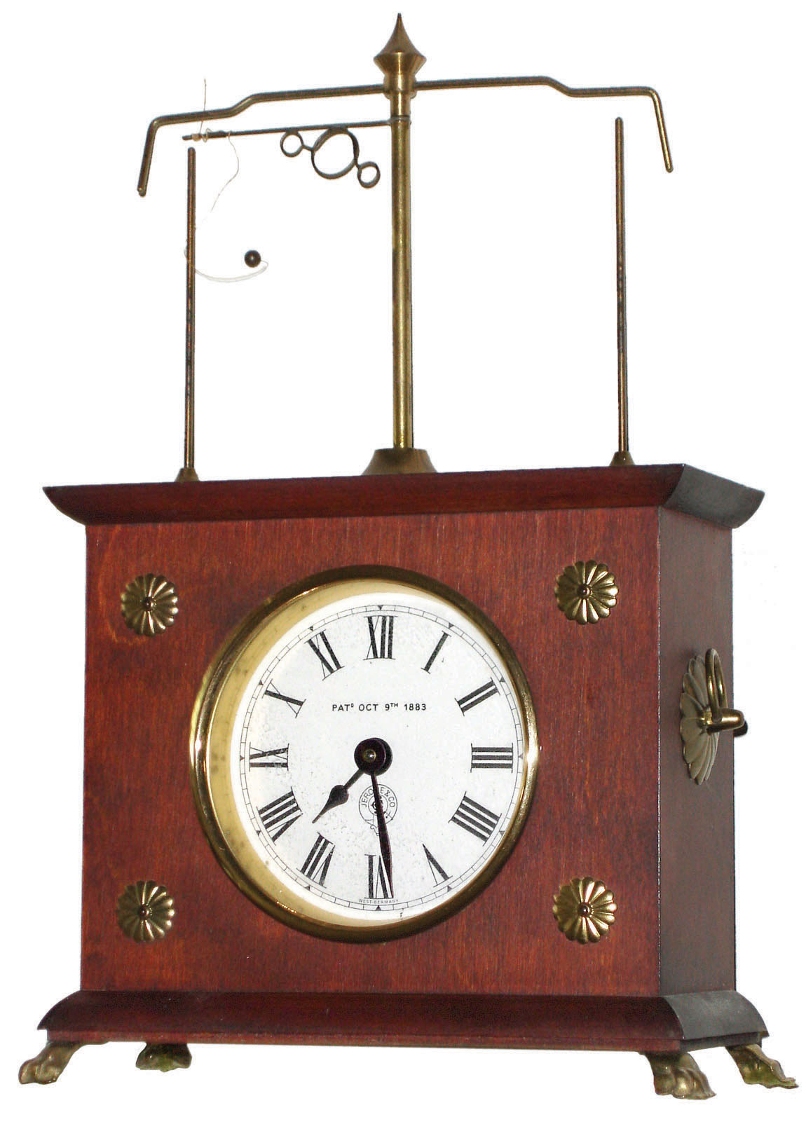 The Horolovar Company, Bronxville, New York, "Ignatz" German reproduction flying ball pendulum clock, with box and documents, c1975 — Antique Clocks Price Guide