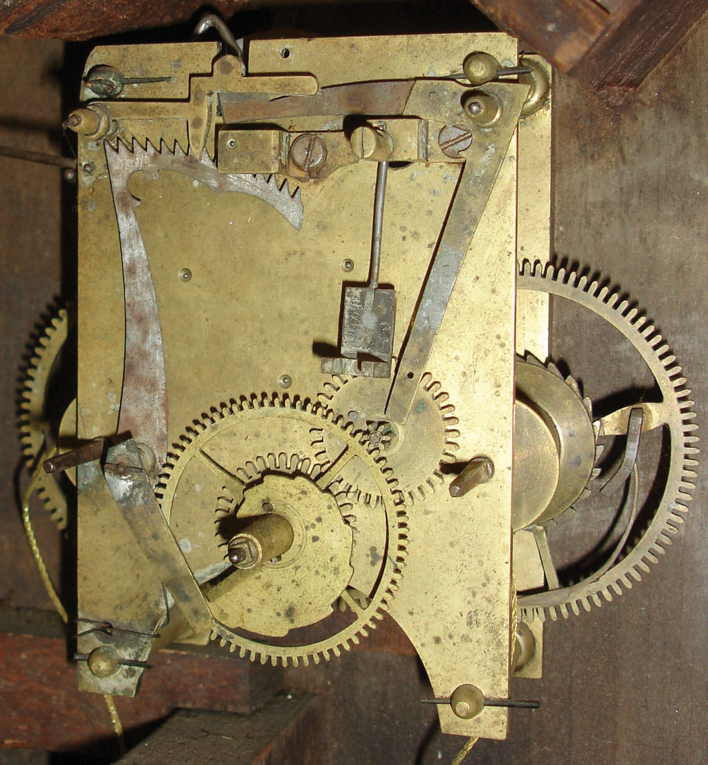 Unknown, 8 day, time and strike weight brass movement New Hampshire mirror clock, c1830.   Based on a similar looking movement found in "New Hampshire Clocks & Clockmakers" by C. Parsons, pg 232 the movement could be by Abiel Chandler, Concord. — Antique Clocks Price Guide