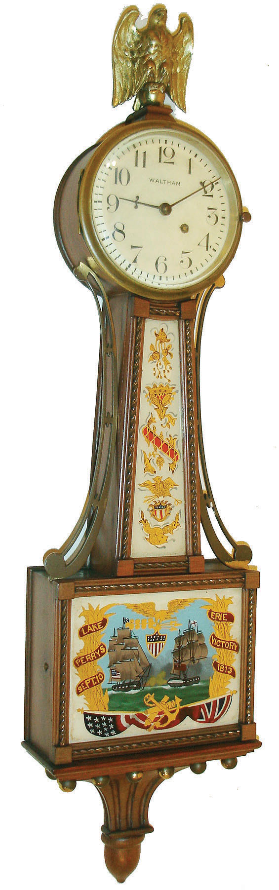 Waltham Clock Co., Waltham, Mass., "Miniature Willard Banjo", 8 days, time only, key wind, spring driven movement with lever escapement in mahogany case with gilt rope front, reverse painted tablets and painted metal dial, c1930 — Antique Clocks Price Guide