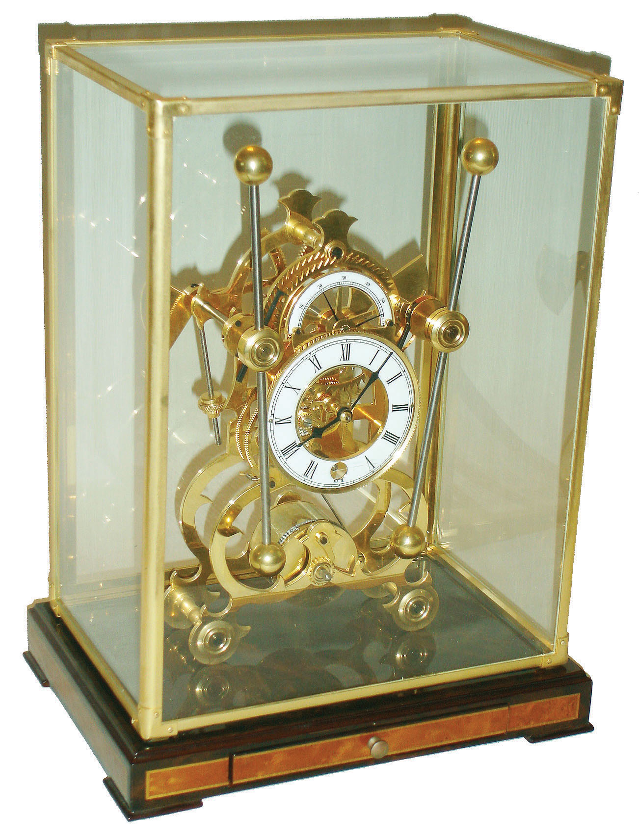 Skeleton clock, China, after the style of John Harrison, with a grasshopper escapement, single fusee timepiece, in a glass and brass case, modern — Antique Clocks Price Guide