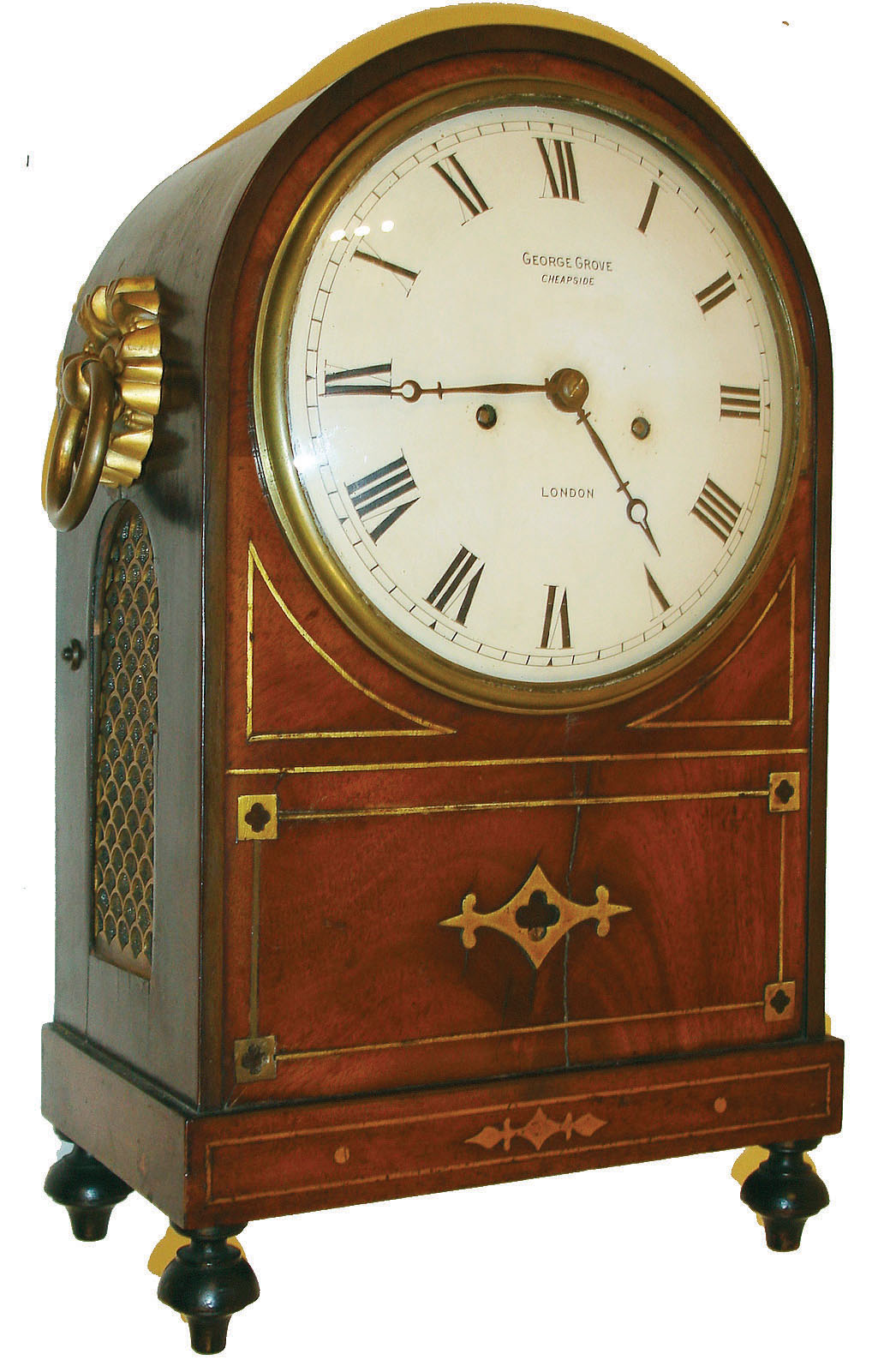 George Grove, Cheapside, London, Regency bracket clock, mahogany case with brass inlay, sides with pierced brass frets, large ring handles with hollow stamped back plates turned feet, Roman numeral, white painted convex metal dial, blued steel Breguet style hands, brass bezel with convex glass, week going two train fusee movement striking the hours on a bell, inside of case with the case makers label, "William Cock Camp Writing Desk Inventor and Manufacturer Makes every Description of Clock & Spring Cases, Ladies and Gentlemen's Dressing & Travelling Cases, Medicine Chests & c. Cock's Buildings Hillgrove St. Bristol.  Wholesale & for Exportation",  c1825 — Antique Clocks Price Guide