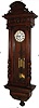 Austrian, Vienna regulator wall clock, 8 days, time, strike and grande sonnerie, three brass weight driven "Remember" movement by Gebruder Resch in carved walnut case with half round columns flanking the door and top pediment with white enamel dial, c1880