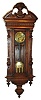 German, Gustav Becker, 3-weight, grand sonnerie, "Vienna Regulator", finely engraved dial center, weights and pendulum, in an over-size oak case with carved top piece and fluted finials, c1890