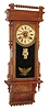 William L. Gilbert Clock Co., Winsted, Conn., "Sharon", wall clock, 8 days, time, strike and McCabe's patent with digital calendar, spring driven movement in an oak case with reverse painted tablet and papered metal dial, c1890