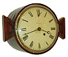 English mahogany barrel form 8 day, fusee spring brass movement wall clock or timepiece, c1815  The dial is signed "Smart",  who might possibly be Benjamin Smart a London clockmaker who worked from 1797-1818 located at 35 Firth Street.  The two "ears" would suggest that this timepiece may have been built into some larger structure.  There are three holes in the case at the six o'clock position that would suggest this timepiece was mounted onto a stand with three pins.