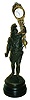 Swinger, bronzed cast metal classical soldier, on turned wood base, holding a German swinging clock, 20th century