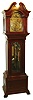 J.J. Elliot, London, England, tall clock, 8 days, time, strike and chime on nine tubes playing three tunes, Westminster, Whittington and St. Michael, three weight driven movement in a mahogany case with paw feet, fully turned reeded columns flanking trunk and hood door, beveled glasses on trunk and broken arch top with silvered chapter ring and moon phase in arch, brass numerals and heavy cutout fancy brass spandrels on corners and center and strike / silent and tune selector, c1900