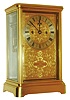 England, oversized crystal regulator, the gilt brass case with beveled glass panels, gilt dial mask with Moorish style engraving and applied, monogrammed plaque, with inset, silvered Roman numeral dial and black painted steel hands, large 8 day fusee movement with ting tang striking at the quarters on 2 gongs, the gong stand mounted to a mahogany board contained inside the base, c1900