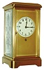 Germany, year going crystal regulator, matte finish lacquered brass case, with beveled glasses, the side glasses with etched designs, gilt dial mat with Arabic numeral, white enamel dial, blued steel hands, rectangular brass movement with 3 plates, resting atop 4 turned pillars attached to the case bottom, large barrel and fusee located behind the train wheels and escapement, dead beat escapement with adjustable pallets, c1920