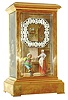 France, large crystal regulator with porcelain panels, gilt case with ogee molded base and top, the front and back with beveled glasses, the rear glass frosted, Arabic numeral dial painted on porcelain panel with genre scene below, showing an interior with a woman pouring wine for a colorfully dressed, seated man, marked "Theo. B. Starr New York" at 6:00, polished brass hands, the panels on the left and right side similarly decorated, and featuring colorfully dressed men enjoying wine, the right panel signed at lower right "DEVALER", 8 day time and strike pendule a Paris movement, striking on a gong, movement numbered 12979, the backs of the porcelain panels bearing that number as well, c1890