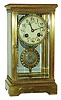 French brass and beveled glass 8 day time and strike crystal regulator, with woman's portrait pendulum, c1900
