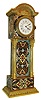 Desk clock, miniature tall clock form, gilt brass case with polychrome champleve enamel, egg and dart cornice, full Corinthian columns, and molded base with leaf decoration, beaded bezel with slightly convex glass, Roman numeral, white enamel dial with floral garlands and Arabic outer five minute markers, blued steel hands, and key wound 30 hour Swiss watch movement, c1900