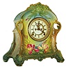 Ansonia Clock Co., New York, NY, "La Plata" Royal Bonn mantel clock, 8 days, time and strike, spring driven movement in a multicolor porcelain case with exposed escapement and white enamel dial, c1915