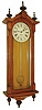 E. Howard & Co., Boston, Mass., "No. 59-8 Regulator" Viennese style wall clock, 8 days, time only, weight driven movement in an oak case with 8" painted metal dial, c1890