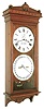 Seth Thomas Clock Company, Thomaston, Conn., "Office Calendar No. 13" wall clock, 8 days, time and perpetual calendar, weight driven movement in a walnut case with painted metal dials and nickel plated brass pendulum bob, c1892