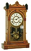 Clocks- 2 (Two): (1) William L. Gilbert Clock Co., "Eros" 8 day time and strike ash and walnut case shelf clock c1885 and (2)  New Haven Clock Co., "Thames", 8 day time and strike walnut shelf clock, c1880.