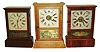 Clocks- 3 (Three) cottage clocks: (1) An E.N. Welch 30 hour time, strike and alarm cottage clock, (2) A Seth Thomas 30 hour time and strike cottage clock (now less veneer) and (3) an unmarked 30 hour cottage timepiece