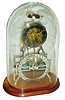 Reproduction by Pro Clocks, China, of Ithaca Clock Co. skeletonized 8 day time and strike calendar clock, on wood base under glass dome, modern
