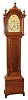 James C. Cole, Rochester, NH, tall clock, 8 days, time, strike and calendar, weight driven brass movement with typical New Hampshire cut outs in a cherry case with applied bracket base and an American painted iron dial, c1815