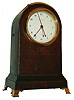 John Mottram, London, miniature time only bracket clock with sweep seconds, the Regency style veneered mahogany case with multicolor bands of inlay and fine string inlay, brass bezel, brass carrying handle, and molded base with brass bracket feet, locking back door with old glass and ivory escutcheon, Arabic numeral white enamel dial with gold spade hands and black painted brass sweep second hand, 8 day fusee timepiece movement with shouldered plates, tapered, turned pillars, and recoil escapement outside the back plate, key wind and set from back, c1800