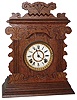 Ansonia Clock Co., New York, "Vinton" oak 8 day time and strike cabinet mantel clock, c1901