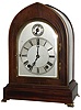 Winterhalder & Hofmeier, Germany, arch top inlaid walnut and beveled glass 8 day 2 train Westminster chime mantel clock, c1910