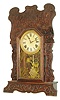 Waterbury Clock Co., Waterbury, Conn., 8 day, time and strike, spring brass movement press oak shelf clock, c1890.